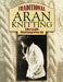 Book cover of 'Traditional Aran Knitting' by Shelagh Hollingworth with a textured background.