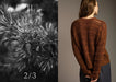 Brown crocheted sweater worn by a person on a plain background, with a close-up of pine needles on the left.