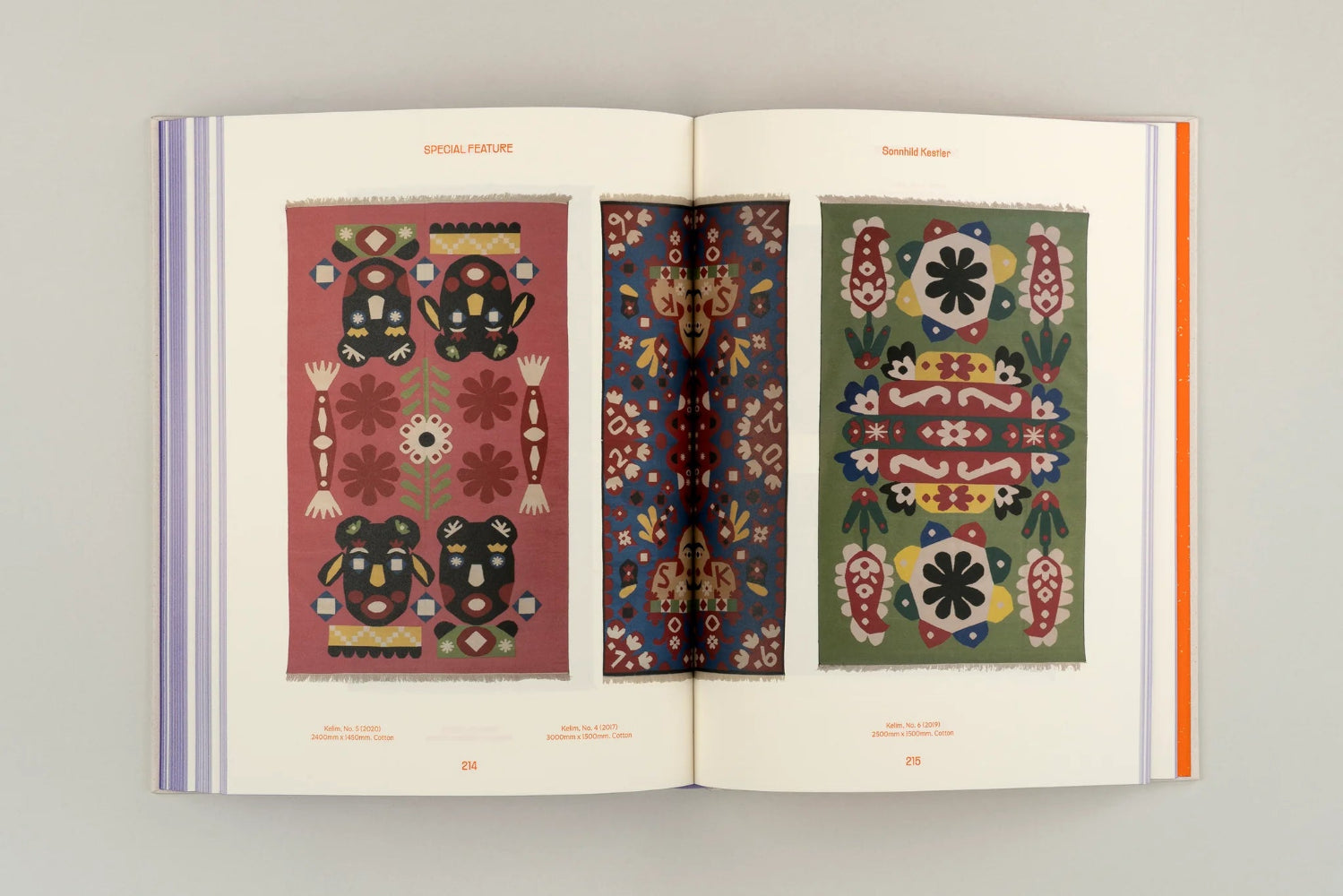 Open book displaying three colorful geometric patterns on a gray background