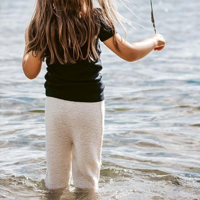 Person standing in water wearing Maureen Leggings 