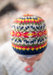 Colorful knitted hat with a blurred background