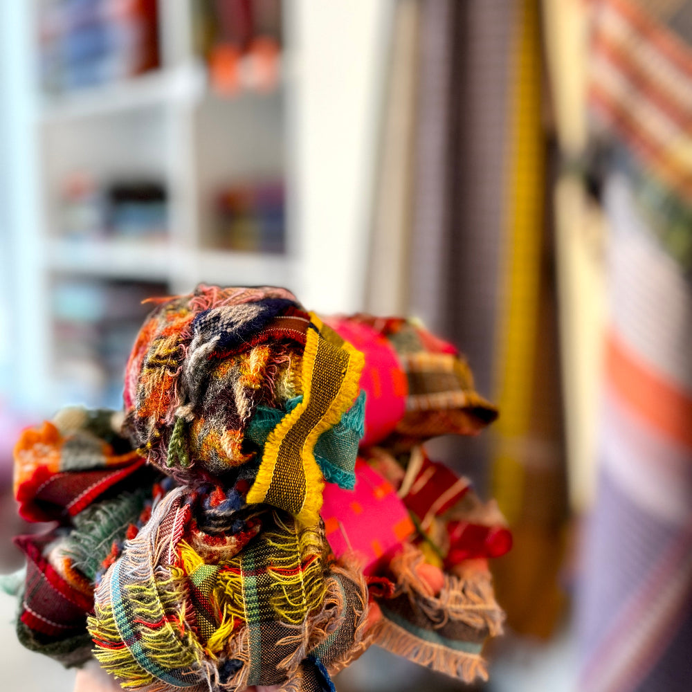 Colorful fabric bundle with blurred background