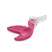 Pink and clear plastic tool on a white background