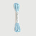 Blue yarn skein with a label on a light gray background