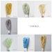 Set of yarn samples with color codes on a white background