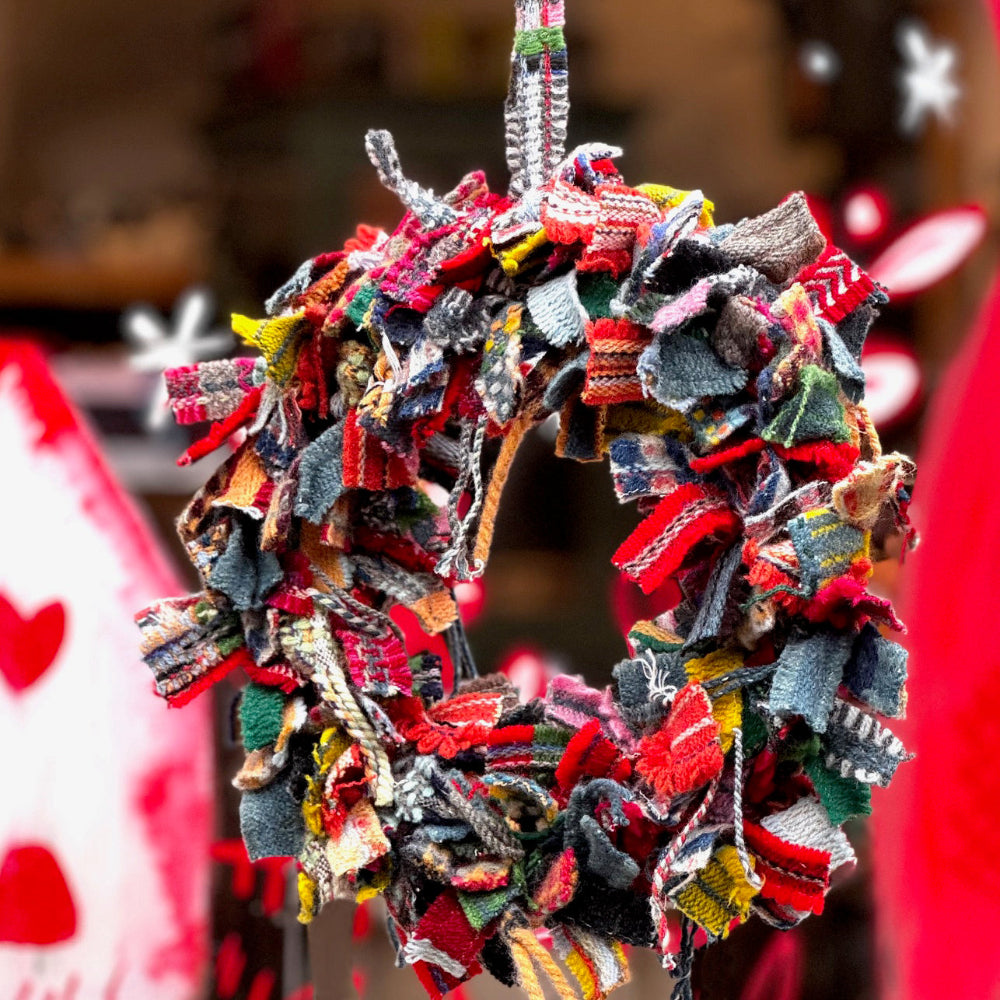 Colorful fabric wreath with a blurred background